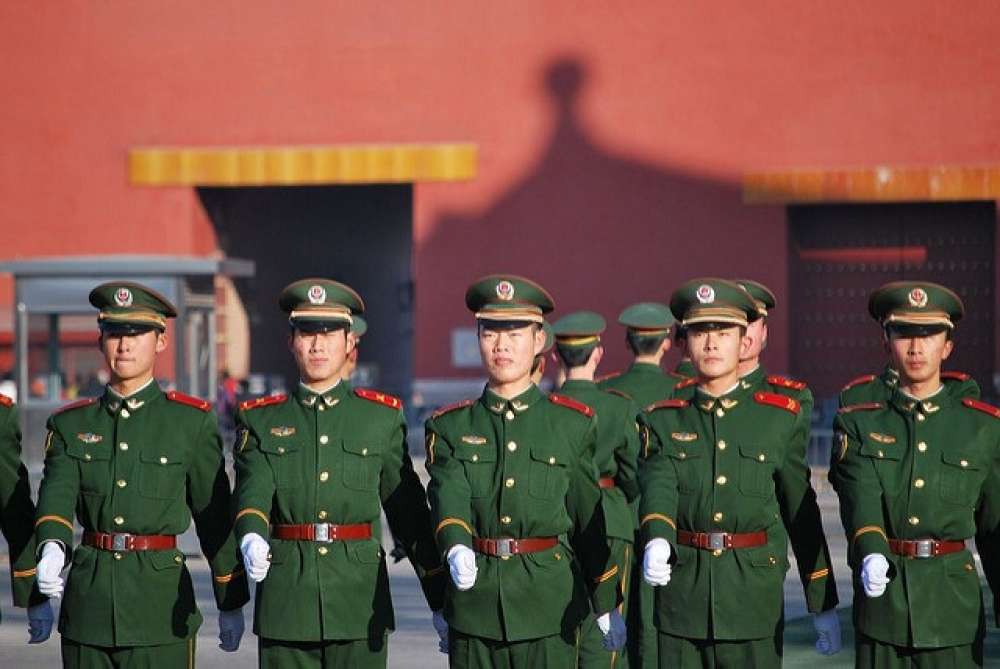 Dingding Chen 2014 China Is No International Security Free Rider